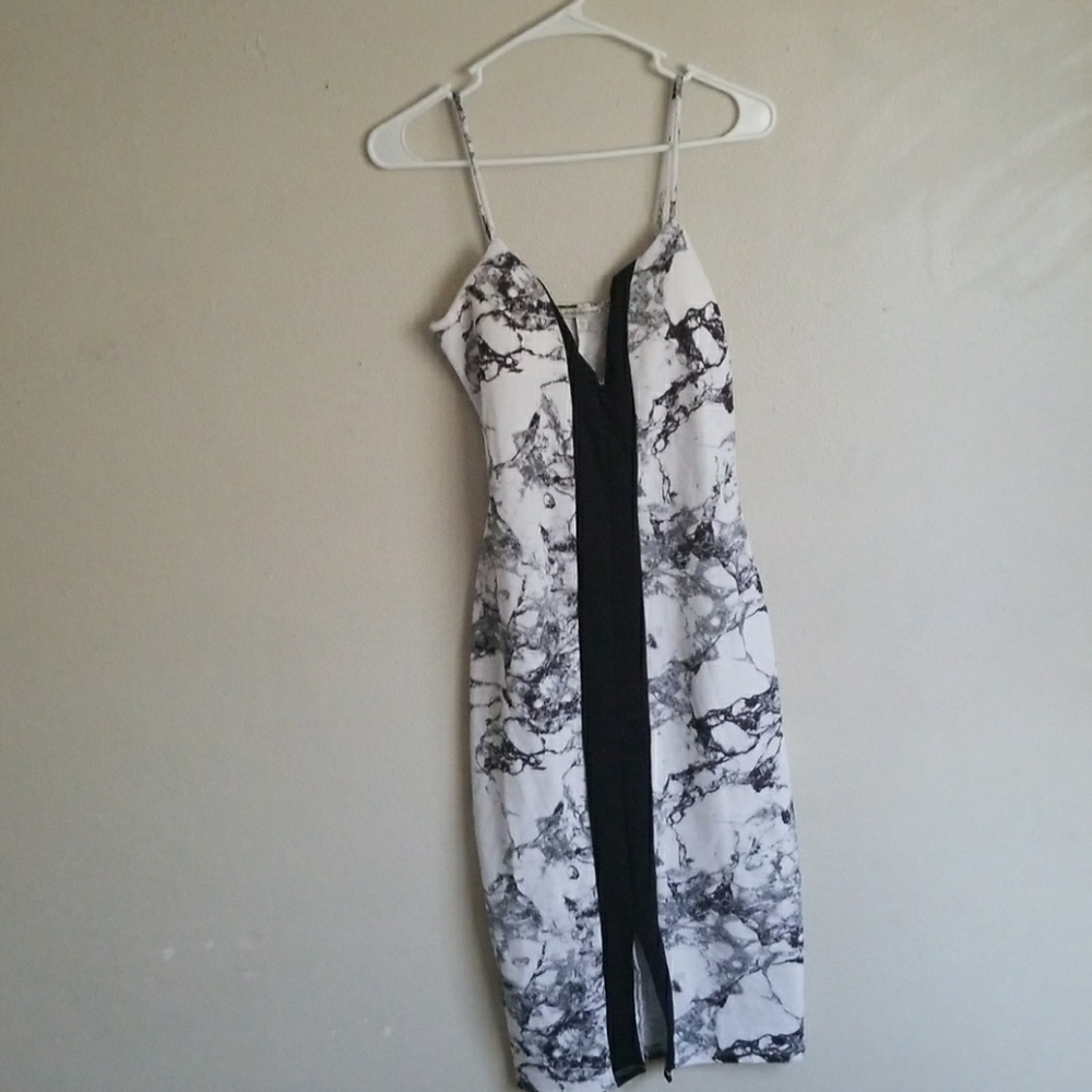 Form fitting front slit dress